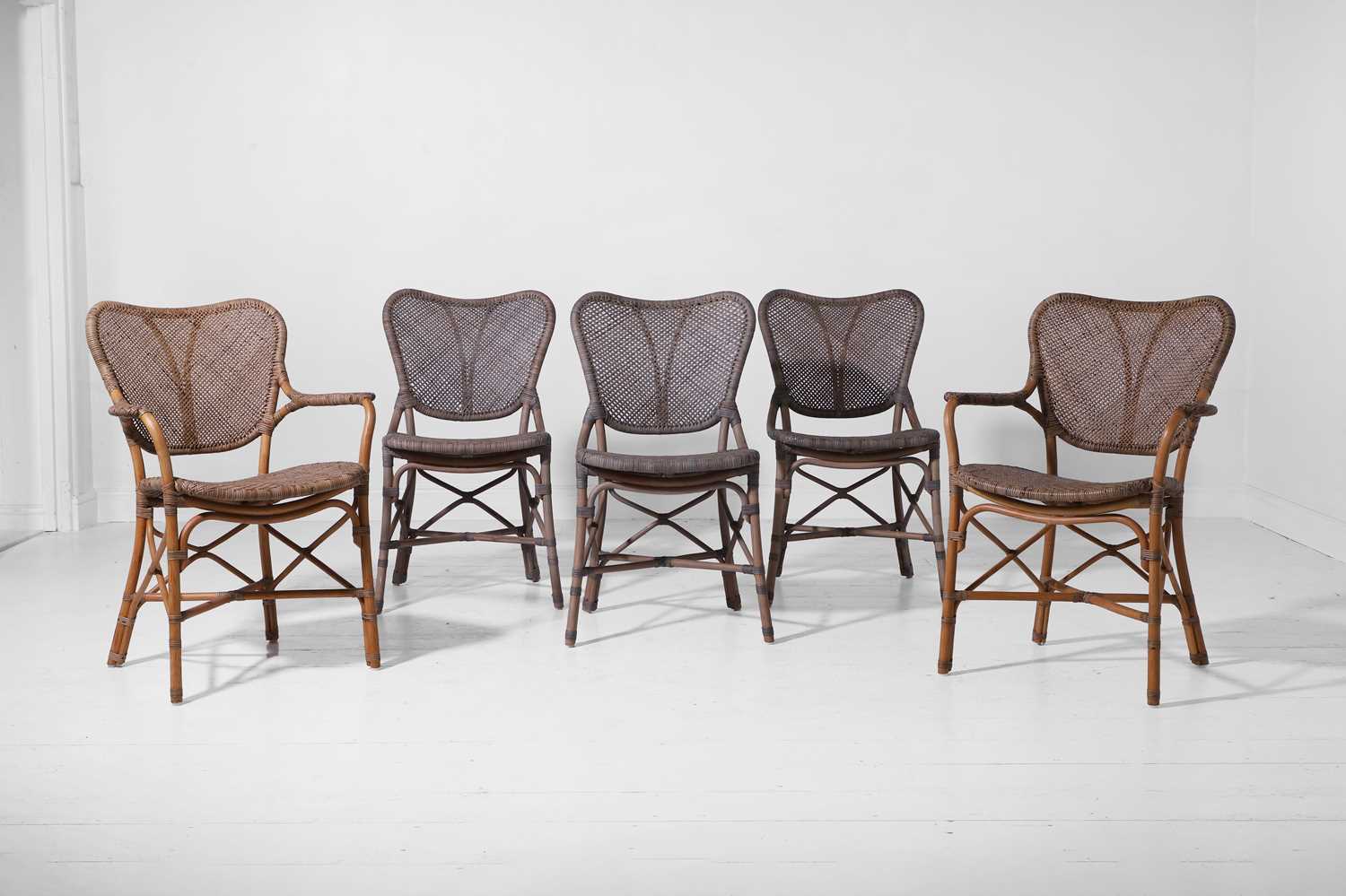 Lot 562 - A group of five rattan 'Jordan' dining chairs by Paolo Moschino