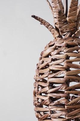 Lot 544 - A pair of woven rattan 'Ananas' table lamps by Paolo Moschino