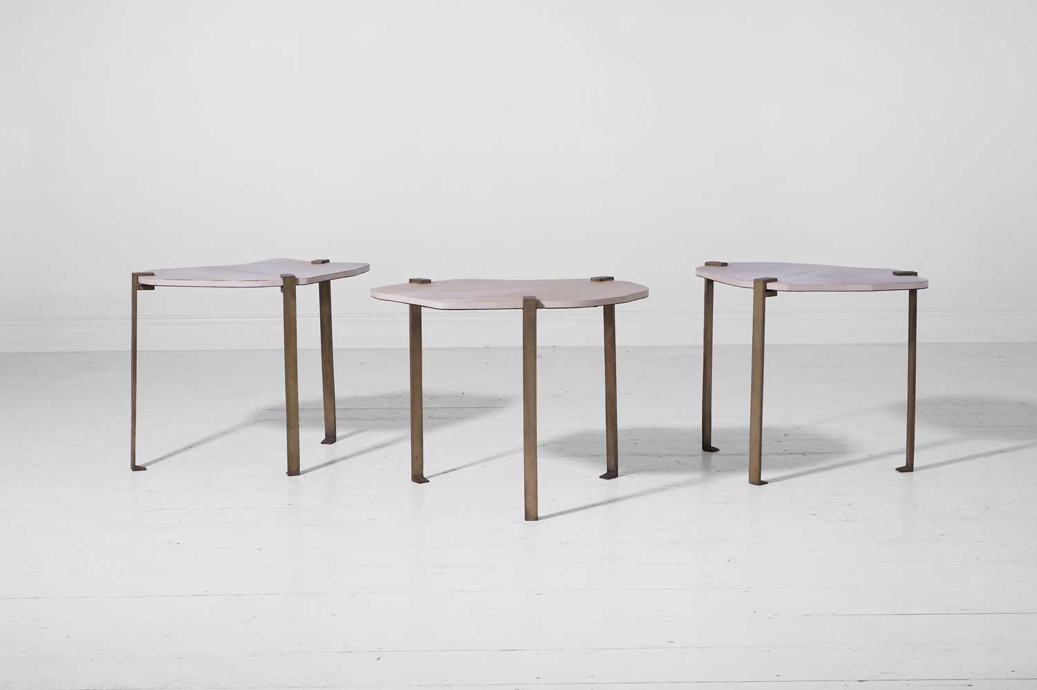 Lot 572 - A trio of modernist brass and vellum occasional tables by Paolo Moschino