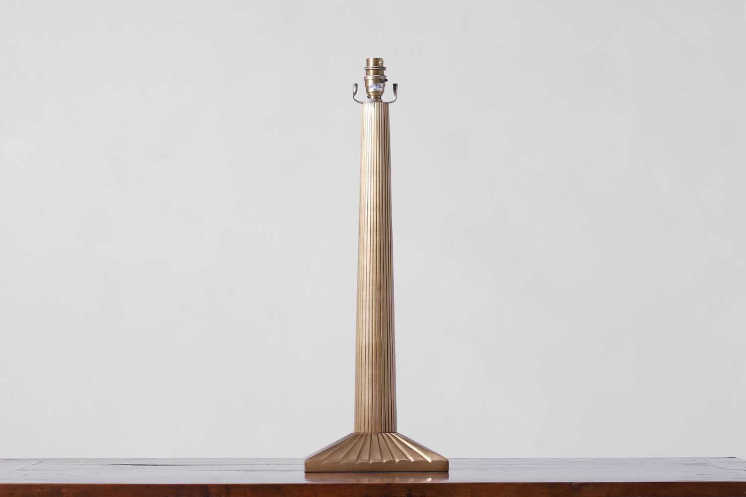 Lot 545 - A brass column table lamp by Paolo Moschino