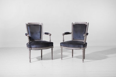 Lot 555 - A pair of Louis XVI-style painted wooden fauteuils