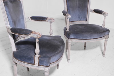 Lot 555 - A pair of Louis XVI-style painted wooden fauteuils