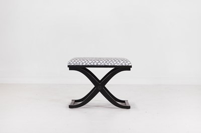 Lot 557 - An ebonised wooden stool by Paolo Moschino