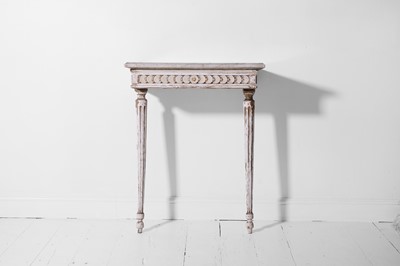 Lot 358 - A Louis XVI-style painted and parcel-gilt wooden pier table