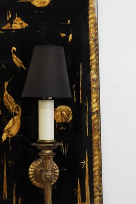 Lot 329 - A pair of verre églomisé wall sconces