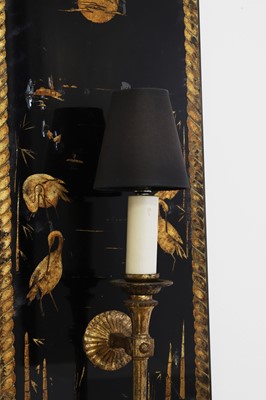 Lot 329 - A pair of verre églomisé wall sconces