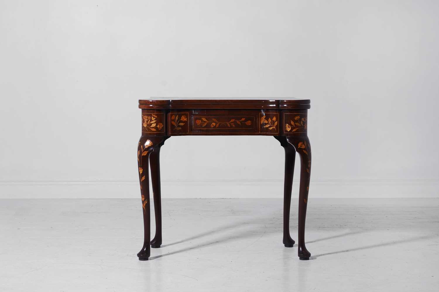 Lot 345 - A mahogany and marquetry card table