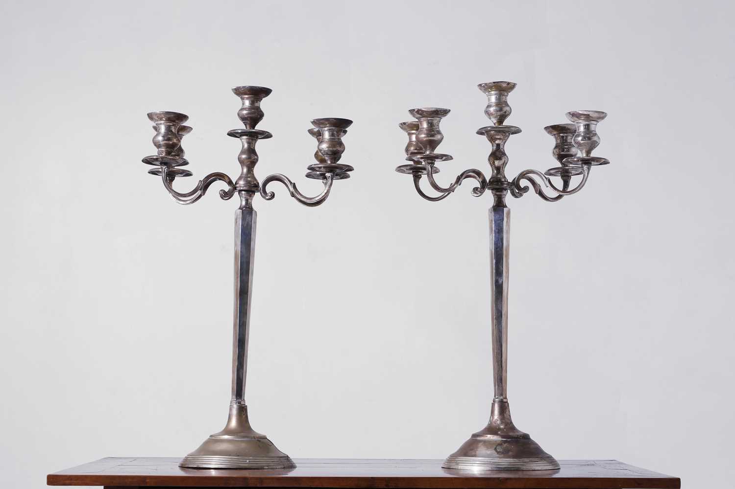 Lot 323 - A pair of large silver-plated candelabra