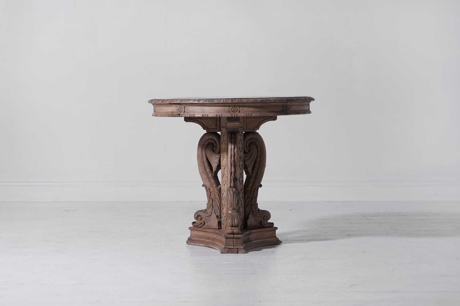 Lot 328 - An Empire-style carved fruitwood and beech guéridon