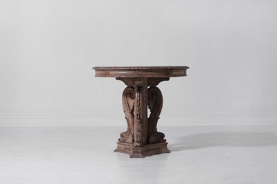 Lot 328 - An Empire-style carved fruitwood and beech guéridon