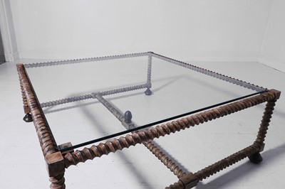 Lot 327 - A large fabricated iron and brass 'Twisted Leg' coffee table by Richard Taylor Designs