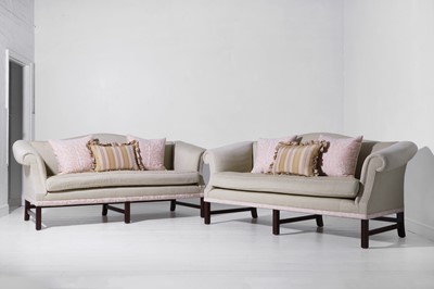 Lot 322 - A pair of ‘Chippendale’ sofas by Peter Dudgeon