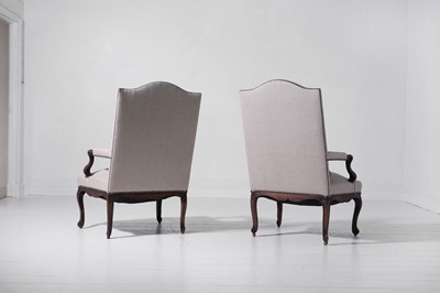 Lot A pair of Louis XV provincial walnut and beech fauteuils