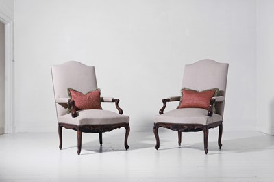 Lot A pair of Louis XV provincial walnut and beech fauteuils