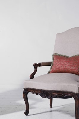 Lot A pair of Louis XV provincial walnut and beech fauteuils