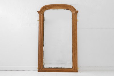 Lot 320 - A Louis XVI-style carved oak pier mirror