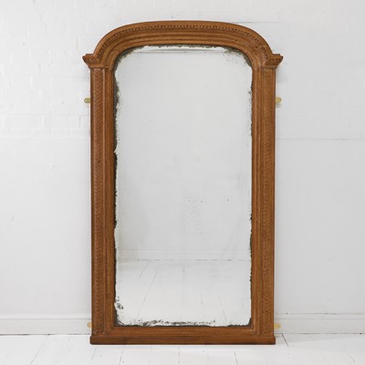 Lot 320 - A Louis XVI-style carved oak pier mirror