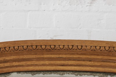Lot 320 - A Louis XVI-style carved oak pier mirror