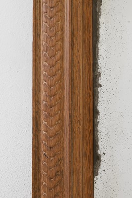 Lot 320 - A Louis XVI-style carved oak pier mirror