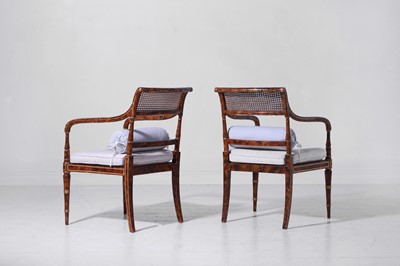 Lot 340 - A pair of Regency-style painted and parcel-gilt beech elbow chairs