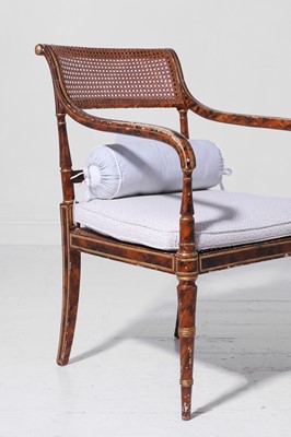 Lot 340 - A pair of Regency-style painted and parcel-gilt beech elbow chairs