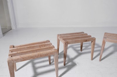 Lot 353 - A set of four bleached oak luggage racks by Thonet