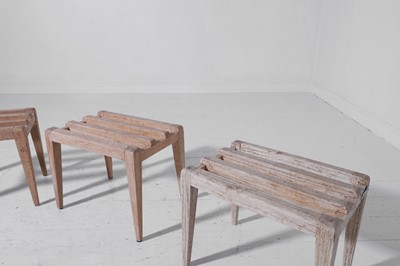 Lot 353 - A set of four bleached oak luggage racks by Thonet