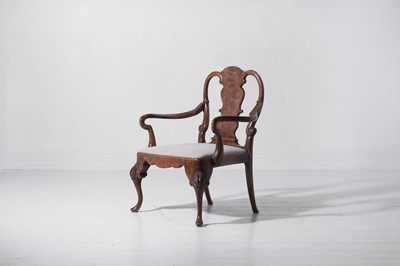 Lot 342 - A large George II-style figured walnut and beech open armchair