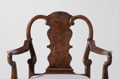 Lot 342 - A large George II-style figured walnut and beech open armchair