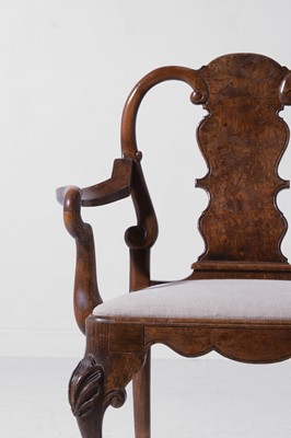 Lot 342 - A large George II-style figured walnut and beech open armchair