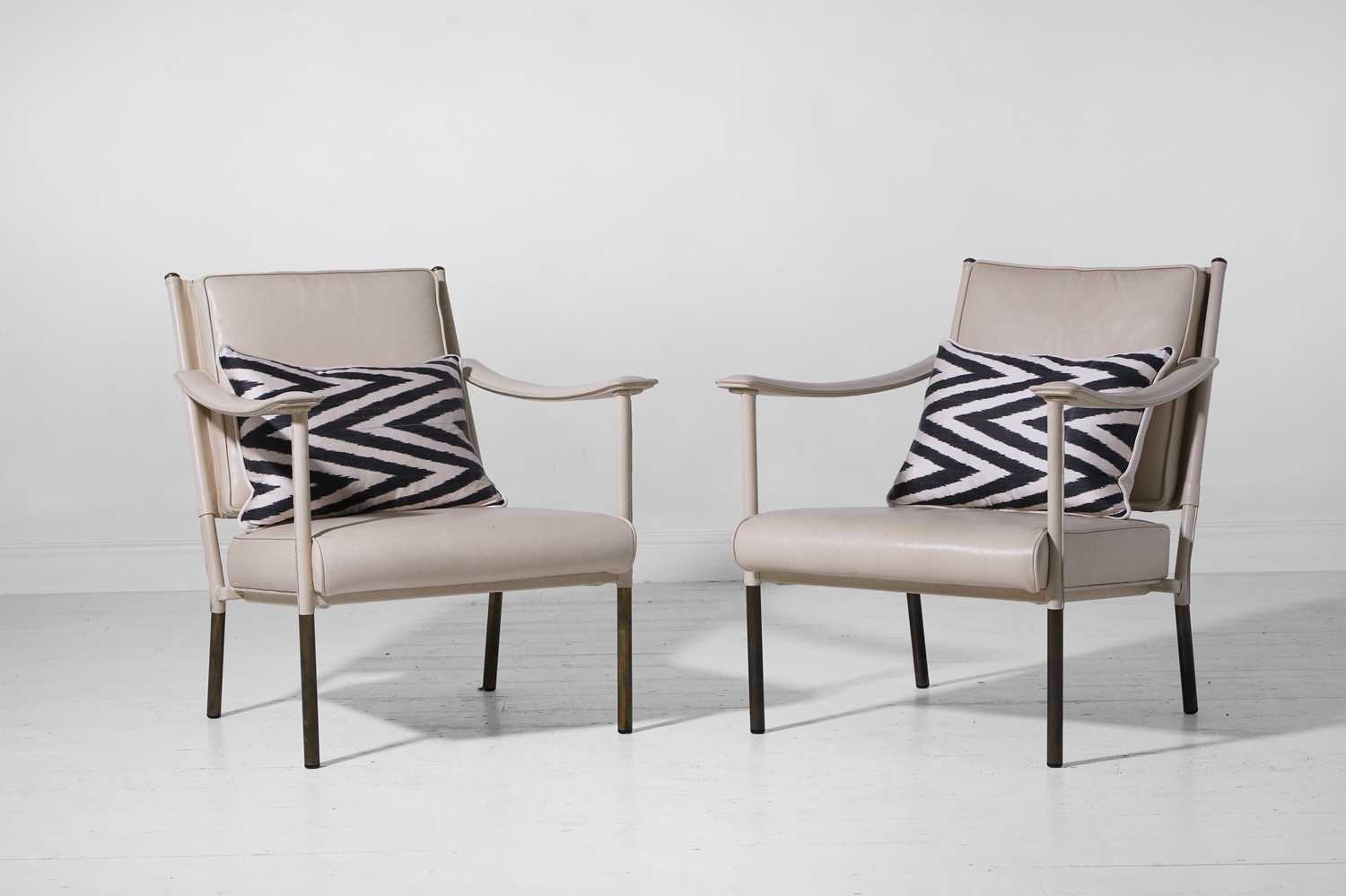 Lot 350 - A pair of brass and leather ‘Crillon’ armchairs by Soane