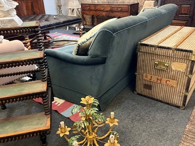 Lot 333 - A three-seater sofa in the style of Howard & Sons