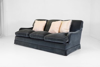 Lot 333 - A three-seater sofa in the style of Howard & Sons