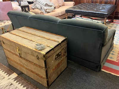 Lot 333 - A three-seater sofa in the style of Howard & Sons