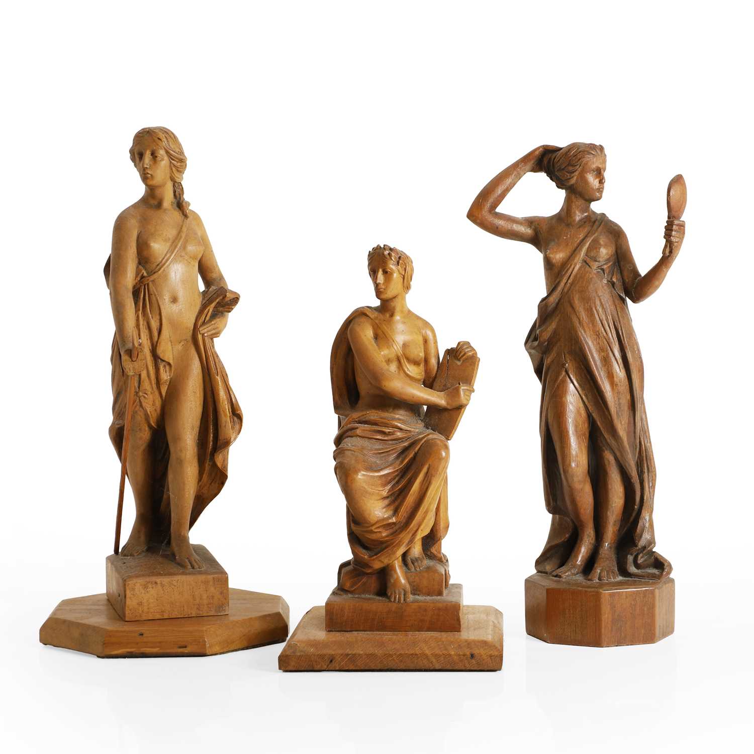 Lot 227 - A collection of three carved wooden figures