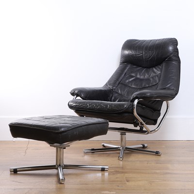 Lot 448 - A Norwegian 'Model N' reclining black leather lounge chair and ottoman