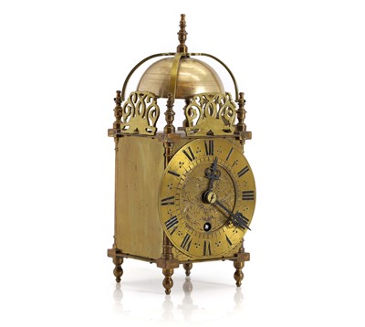 Lot 205 - A brass cased lantern clock