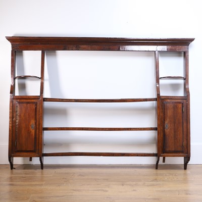 Lot 471 - An oak delft rack with open shelves and cupboard