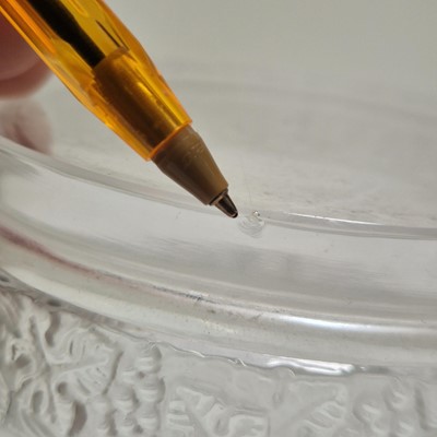Lot 119 - A pair of Lalique 'Ricquewihr' glass vases or 'Lave-raisins'