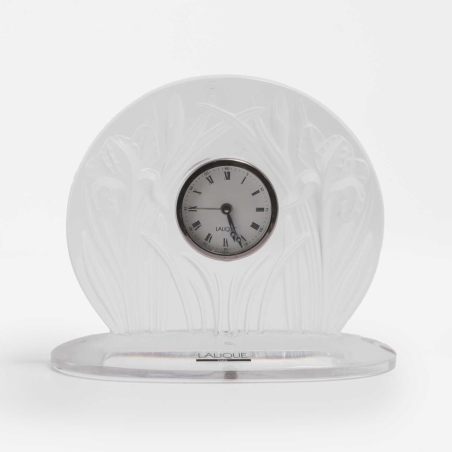 Lot 114 - A Lalique 'Iris' glass mantel timepiece