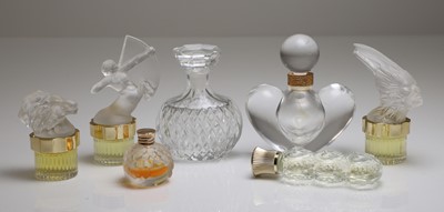 Lot 182 - A collection of glass scent bottles