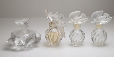 Lot 186 - A group of Lalique glass scent bottles