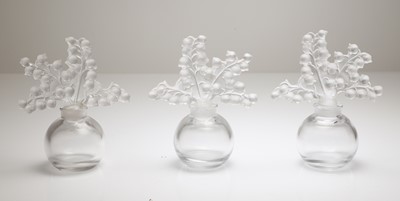 Lot 185 - A group of three Lalique 'Clairefontaine' glass scent bottles