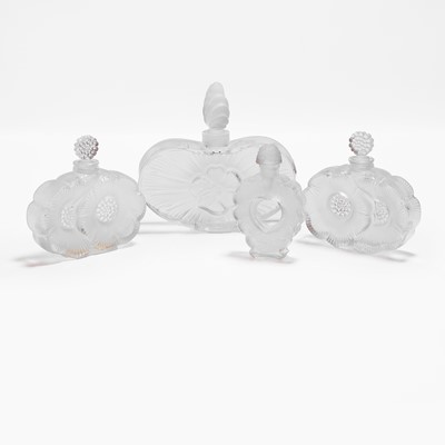 Lot 125 - A group of Lalique glass scent bottles