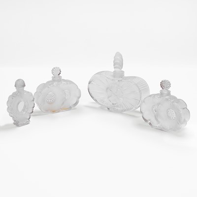 Lot 125 - A group of Lalique glass scent bottles
