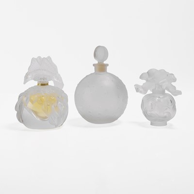 Lot 134 - A group of three Lalique glass scent bottles