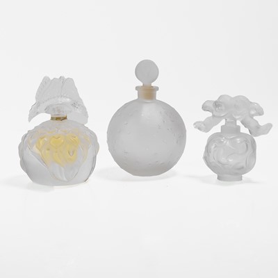 Lot 134 - A group of three Lalique glass scent bottles