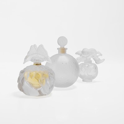 Lot 134 - A group of three Lalique glass scent bottles
