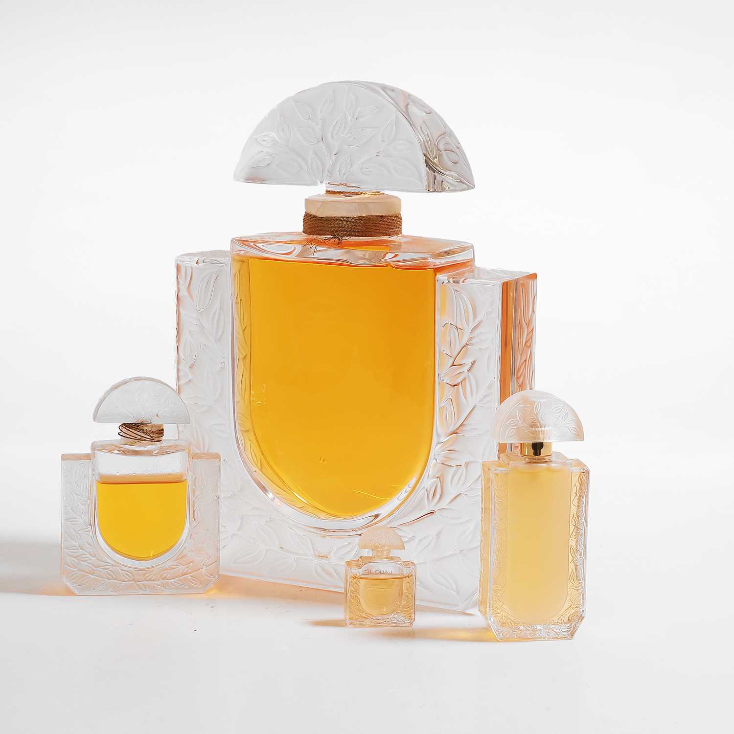 Lot 129 - A Lalique 'Chevrefeuille' glass factice scent bottle