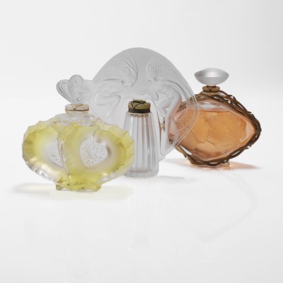 Lot 135 - A collection of Lalique glass scent bottles